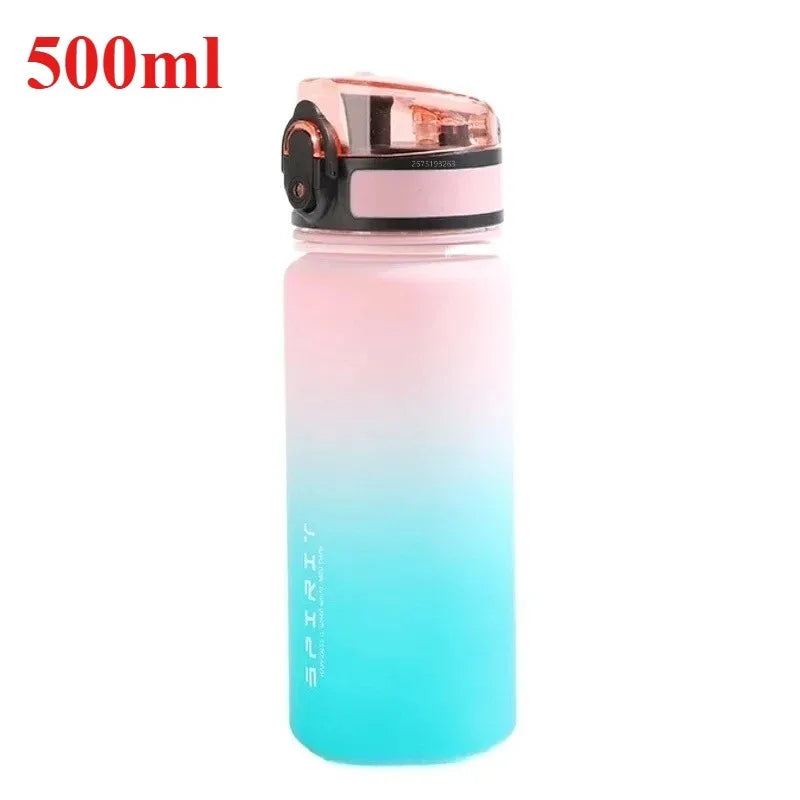 Gradient pink to blue water bottle with 'Nihon' branding on a white background