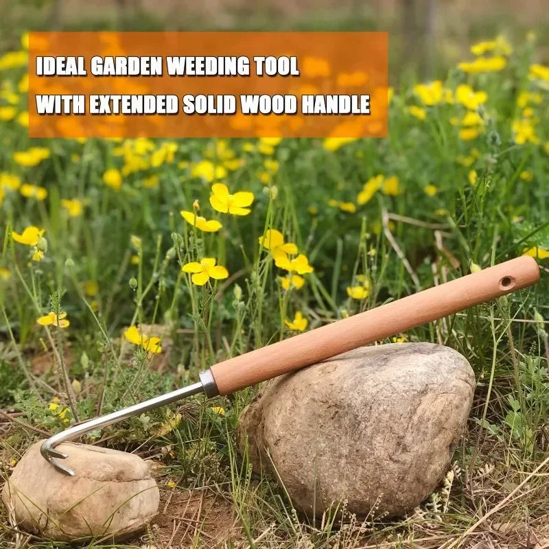 Garden weeding tool with extended solid wood handle on a natural background
