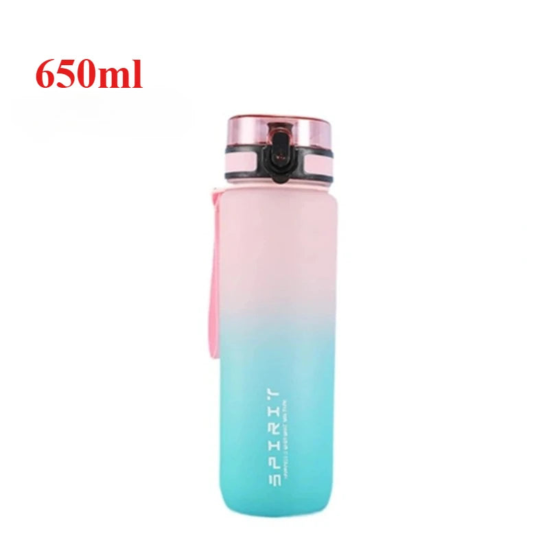 Gradient pink to blue water bottle with 'SPIRIT' branding on a white background