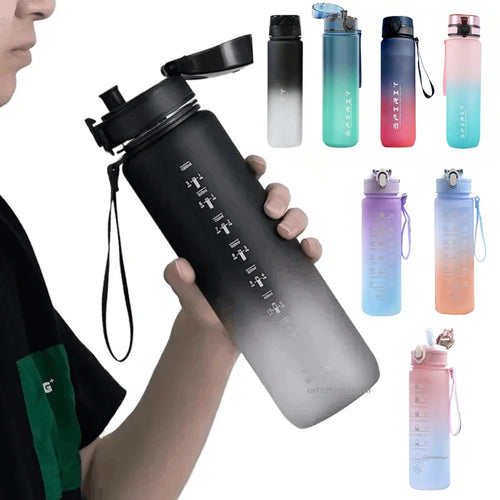 Person holding a black gradient water bottle with other colorful bottles in the background
